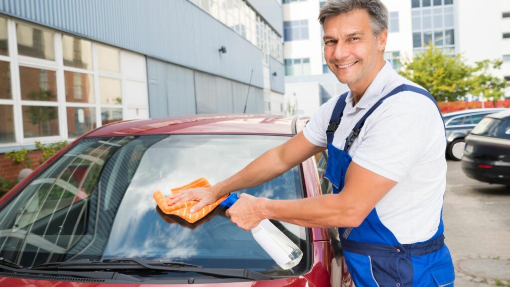 cleaning car windshield